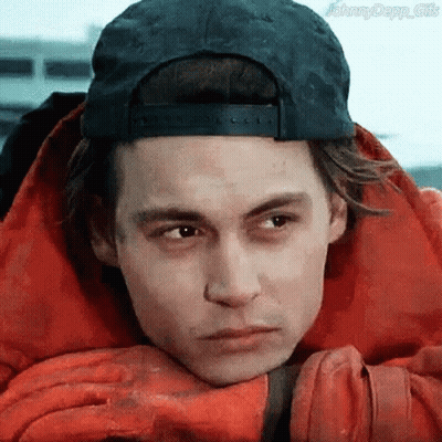 A Man Wearing A Baseball Cap And A Red Jacket GIF