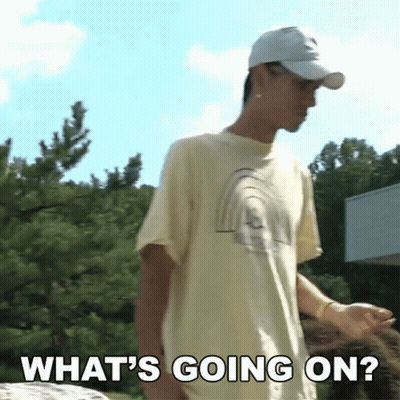 A Man Wearing A Baseball Cap And A T-Shirt Says What 'S Going On GIF