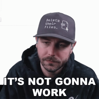 A Man Wearing A Baseball Cap That Says Delete Their Files GIF