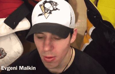 A Man Wearing A Baseball Cap With The Name Evgeni Malkin On It GIF
