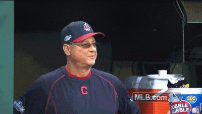 A Man Wearing A Baseball Uniform With The Letter C On The Front GIF