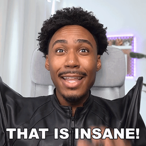 A Man Wearing A Bat Costume With The Words That Is Insane Below Him GIF