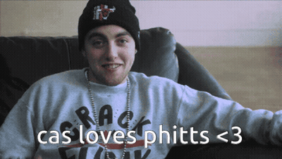 A Man Wearing A Beanie And A Sweater With The Words Cas Loves Phitts < 3 On It GIF