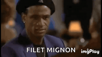 A Man Wearing A Beret Is Making A Funny Face And Says Filet Mignon GIF