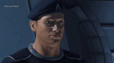A Man Wearing A Beret With The Letter A On It Looks At The Camera GIF