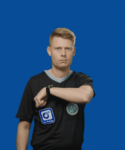 A Man Wearing A Black Adidas Shirt Holds Up A Yellow Card GIF