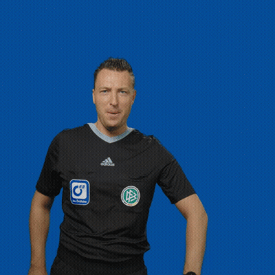 A Man Wearing A Black Adidas Shirt Holds Up A Yellow Card GIF