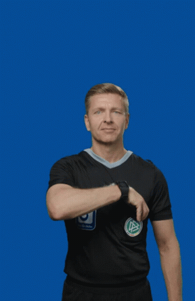 A Man Wearing A Black Adidas Shirt Holds Up A Yellow Card GIF