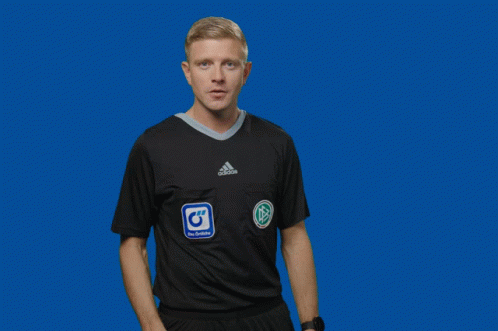 A Man Wearing A Black Adidas Shirt Holds Up His Hands GIF