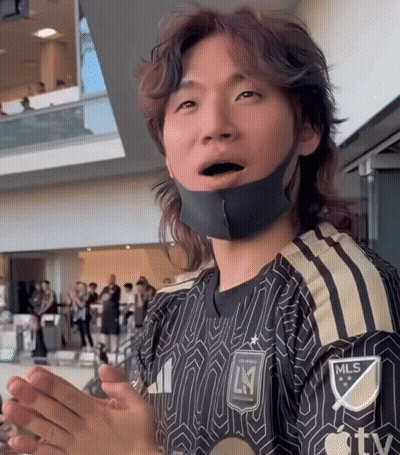 A Man Wearing A Black And Gold Mls Jersey GIF