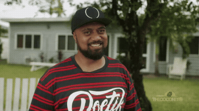 A Man Wearing A Black And Red Striped Shirt That Says ' Doetik ' On It GIF