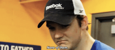 A Man Wearing A Black And White Reebok Hat Says None Of Them GIF