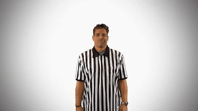 A Man Wearing A Black And White Striped Referee Shirt GIF