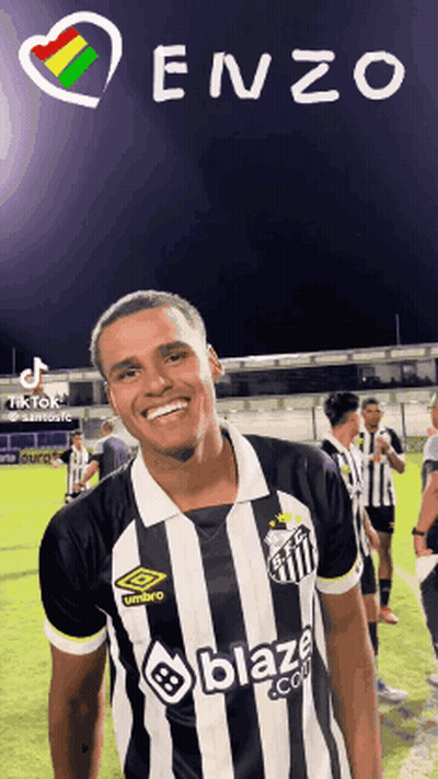 A Man Wearing A Black And White Striped Shirt That Says Blaze GIF