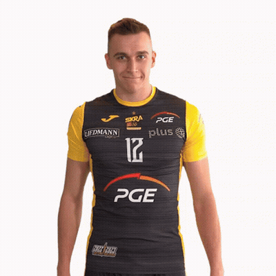 A Man Wearing A Black And Yellow Shirt With Pge On It GIF