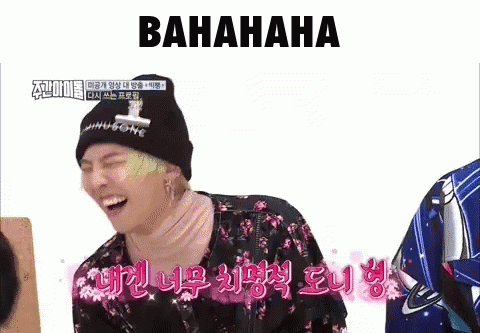 A Man Wearing A Black Beanie And A Floral Shirt Is Laughing With The Word Bahahaha Written Above Him GIF