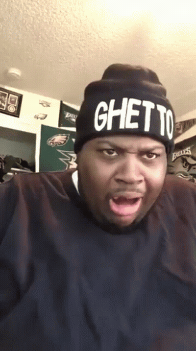A Man Wearing A Black Beanie That Says Ghetto GIF
