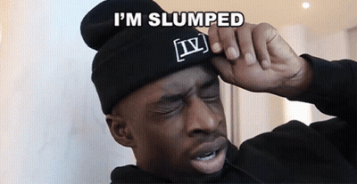 A Man Wearing A Black Beanie With Iv On It GIF