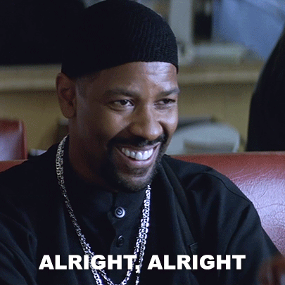 A Man Wearing A Black Hat And A Necklace Is Smiling With The Words Alright Alright Behind Him GIF