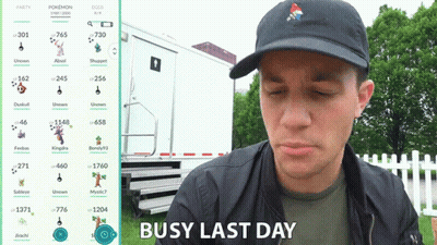 A Man Wearing A Black Hat Says Busy Last Day In Front Of A White Trailer GIF