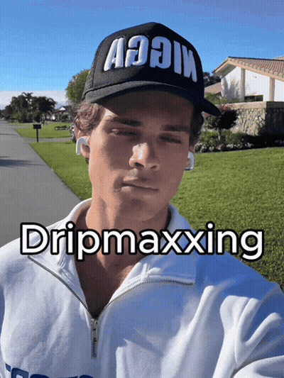 A Man Wearing A Black Hat That Says Aooin On It GIF