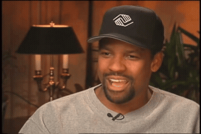 A Man Wearing A Black Hat With A Logo On It GIF