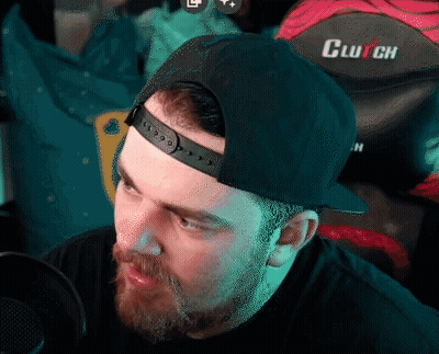 A Man Wearing A Black Hat With The Word Clutch On The Back GIF