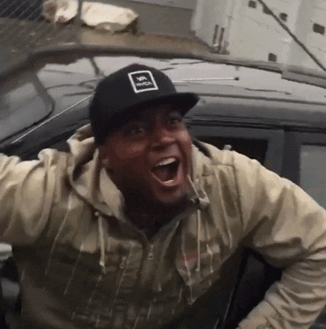 A Man Wearing A Black Hat With The Word Rvca On It GIF