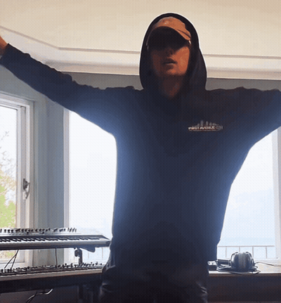 A Man Wearing A Black Hoodie That Says First Avenue On It GIF