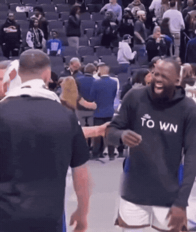 A Man Wearing A Black Hoodie That Says Town GIF