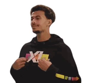 A Man Wearing A Black Hoodie That Says Xl On It Sticker