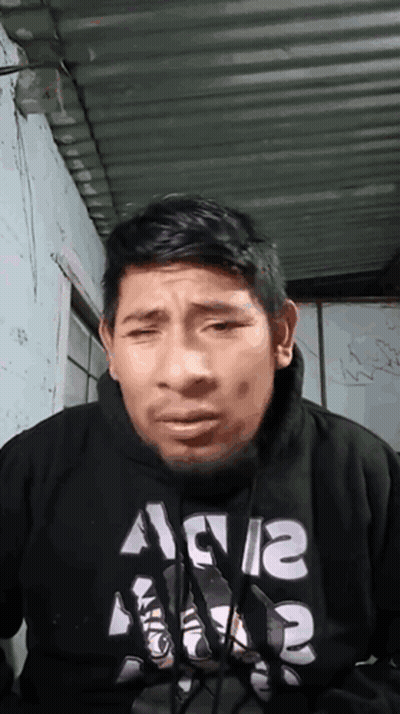 A Man Wearing A Black Hoodie With The Letters A And A On It GIF
