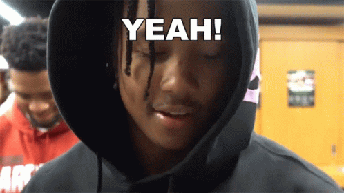 A Man Wearing A Black Hoodie With The Word Yeah On His Face GIF