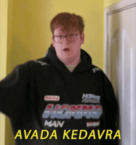 A Man Wearing A Black Hoodie With The Words Avada Kedavra On It GIF