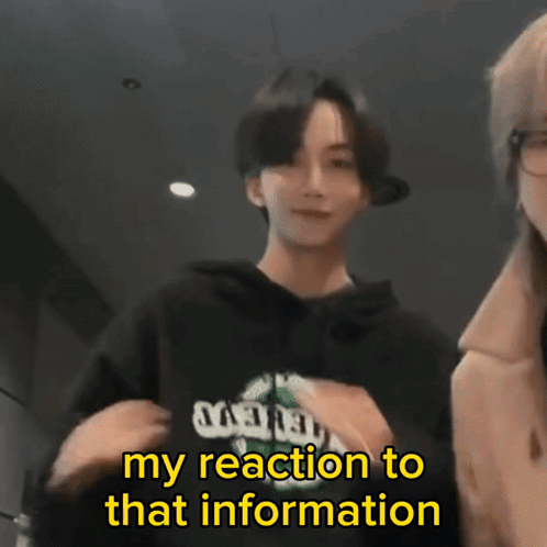 A Man Wearing A Black Hoodie With The Words " My Reaction To That Information " Below Him GIF