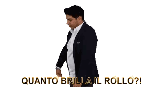A Man Wearing A Black Jacket And A White Shirt Has The Words Quanto Brilla Il Rollo On The Bottom Sticker