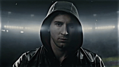 A Man Wearing A Black Jacket With A Hood GIF