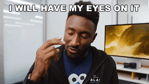 A Man Wearing A Black Jacket With The Words " I Will Have My Eyes On It " GIF