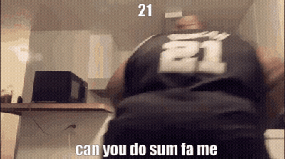 A Man Wearing A Black Jersey With The Number 21 On The Back GIF