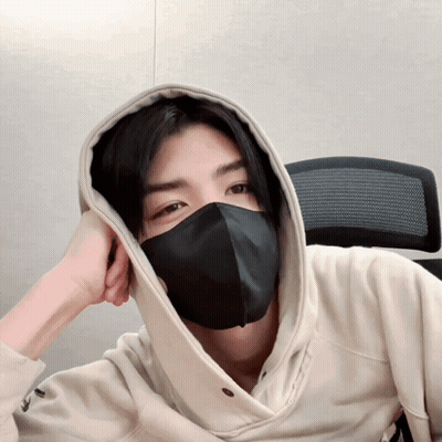 A Man Wearing A Black Mask And A Hoodie GIF