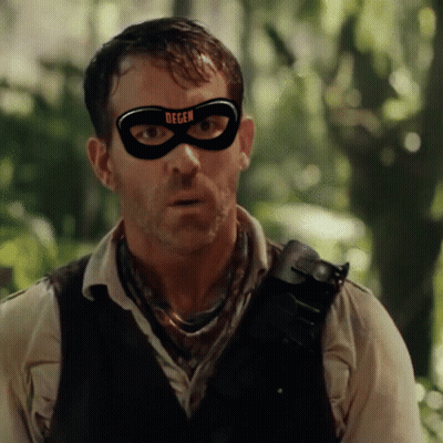 A Man Wearing A Black Mask With The Word Degen On It GIF