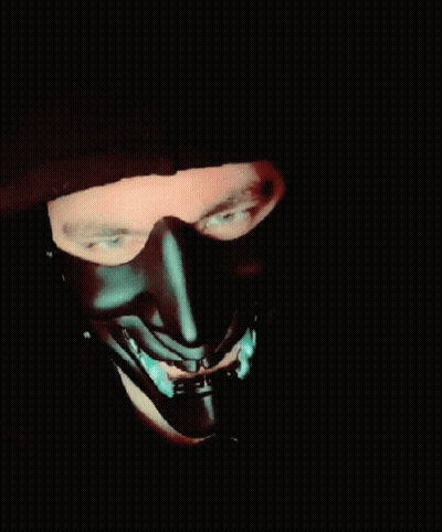 A Man Wearing A Black Mask With The Words " Behave Yourself " On The Bottom GIF