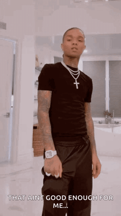 A Man Wearing A Black Shirt And A Cross Necklace Says That Ain T Good Enough For Me .. GIF