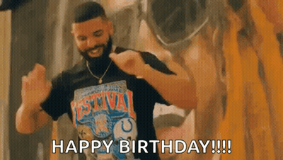 A Man Wearing A Black Shirt Is Dancing In Front Of A Painting And Says `` Happy Birthday '' . GIF