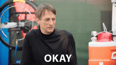 A Man Wearing A Black Shirt Says Okay GIF