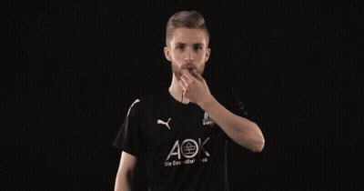 A Man Wearing A Black Shirt That Says Aok GIF
