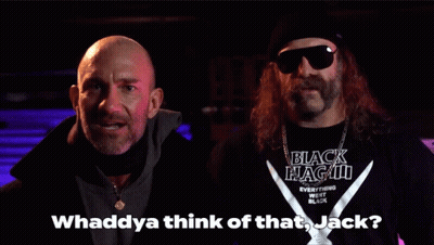 A Man Wearing A Black Shirt That Says Black Flag Iii On It GIF