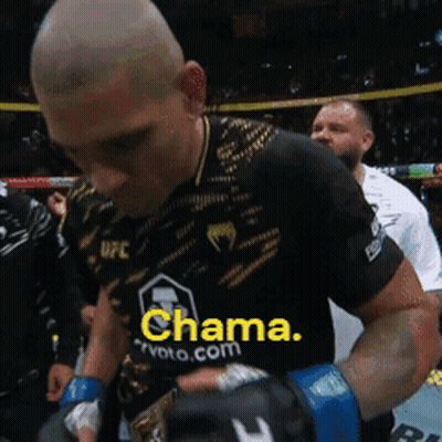 A Man Wearing A Black Shirt That Says Chama GIF