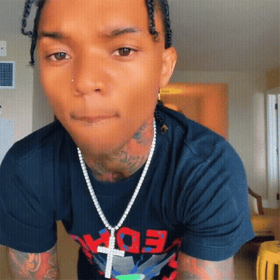 A Man Wearing A Black Shirt That Says Edx On It GIF