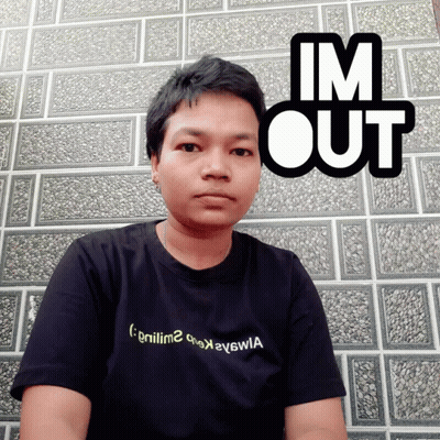 A Man Wearing A Black Shirt That Says ' Gniiim2 ' On It GIF